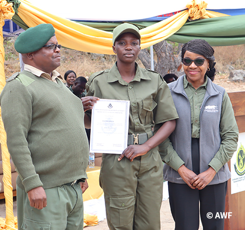 Scout holding certificate