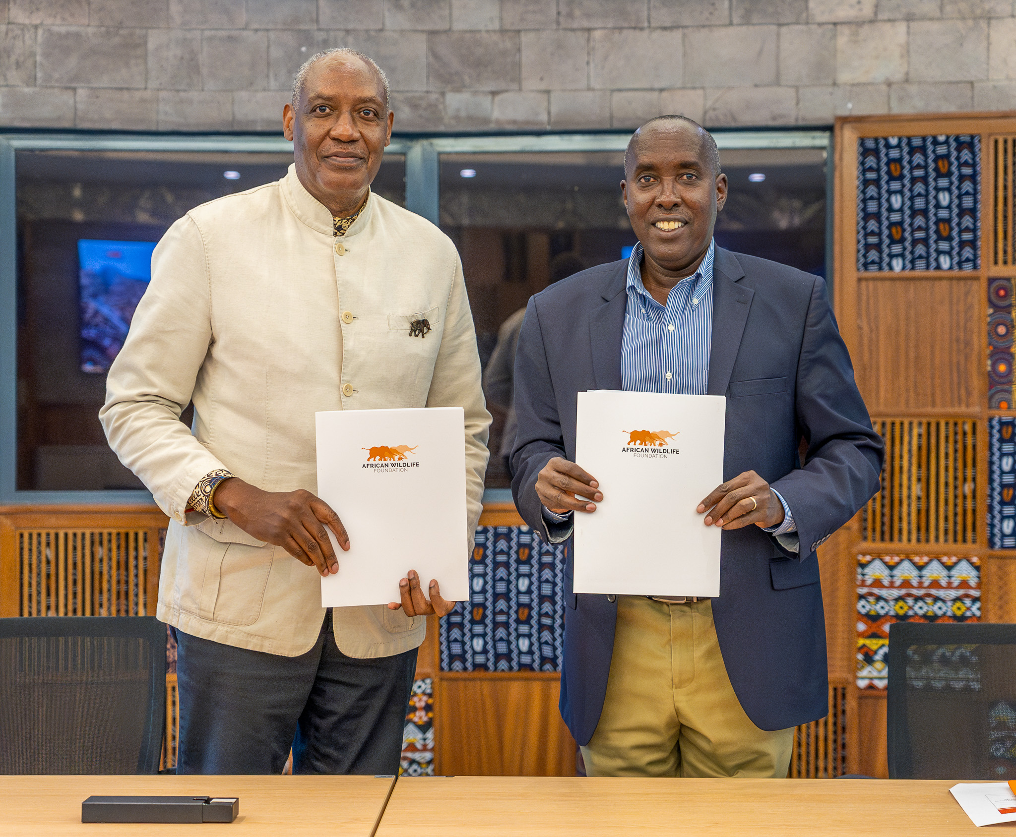AWF CEO Kaddu Sebunya and Kajiado County Governor H.E. Joseph Ole Lenku during a courtesy visit to the AWF Headquarters.