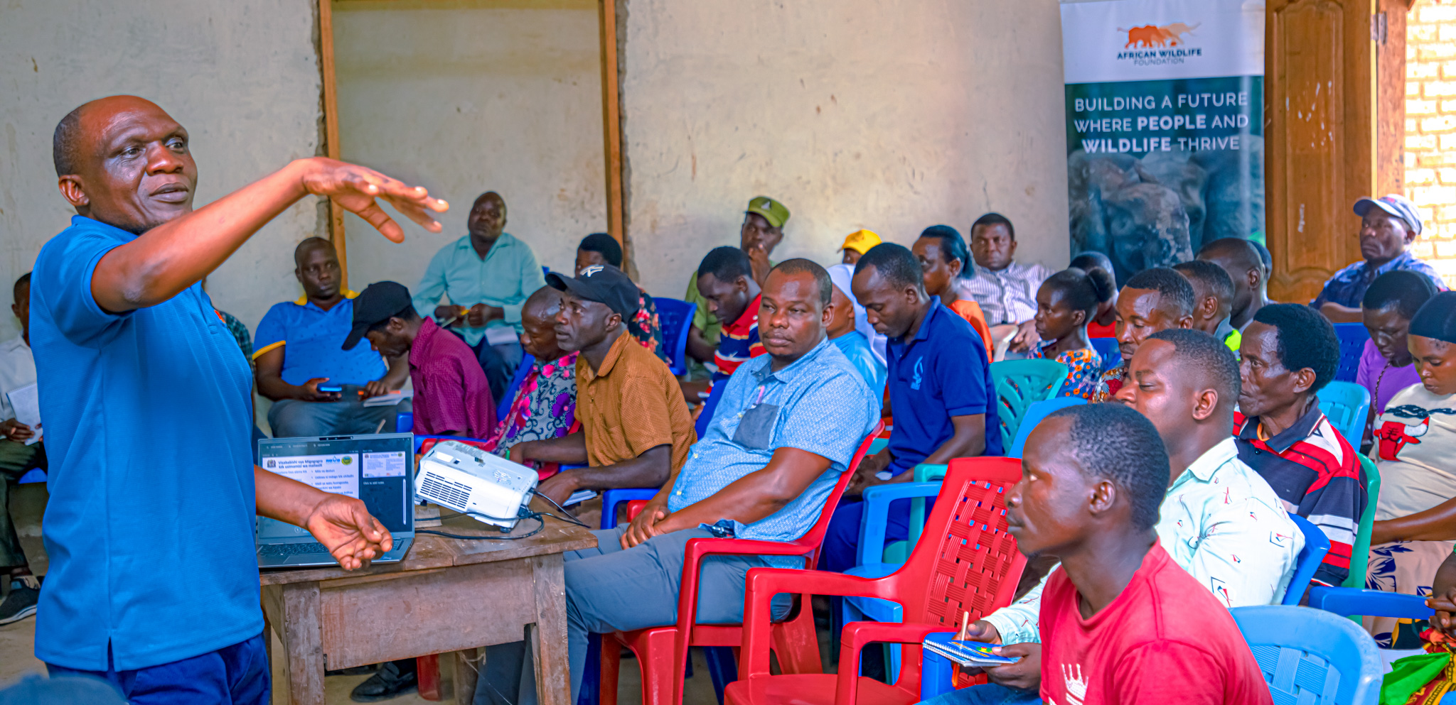 AWF Tanzania Agriculture Officer Alexander Mpwaga leads a community validation and training session in Tanzania’s Kilombero Landscape.