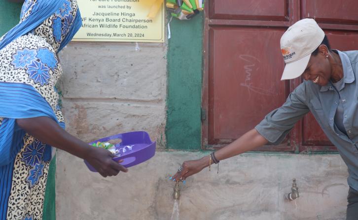 AWF Kenya Board Chair Jacqueline Hinga officially launches the Diwadane Borehole in Taita Taveta County.