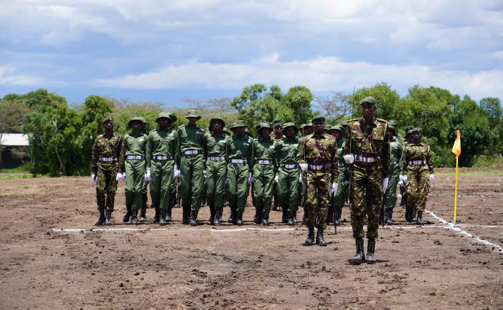 Community scouts marching during the graduation parade.