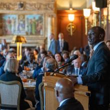 H.E. William Ruto speaks at a podium during an event in Washington, DC.
