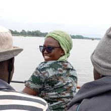 Maeva crossing river Faro to go collect data for her first time..jpeg